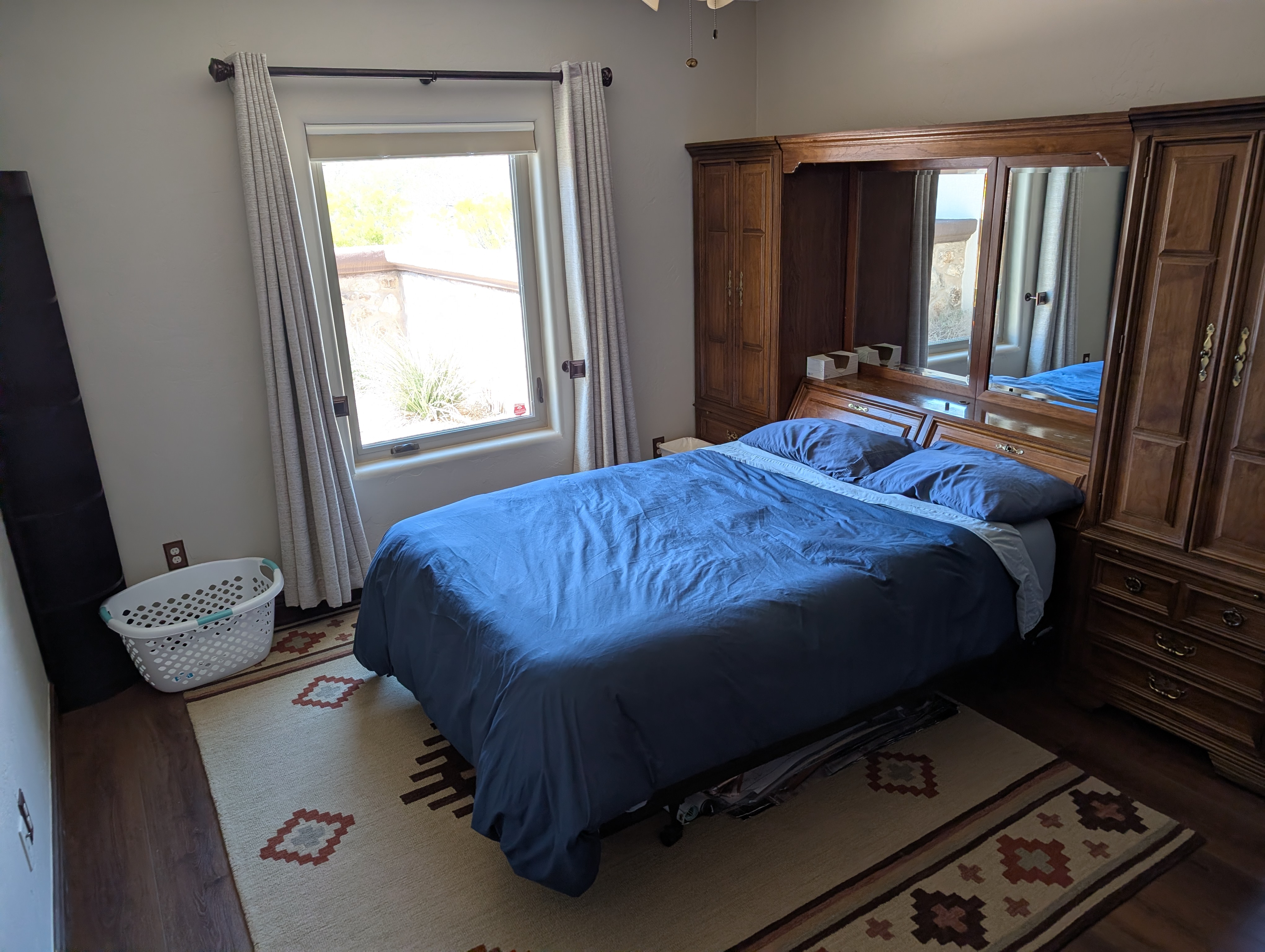 Bedroom with window view and furnished suite