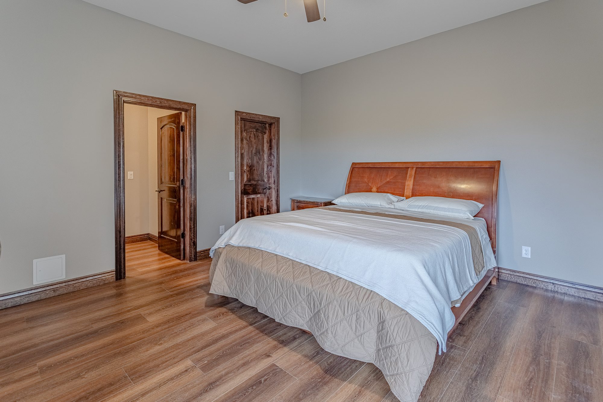 Casita bedroom from opposite angle showing closet and bathroom entry