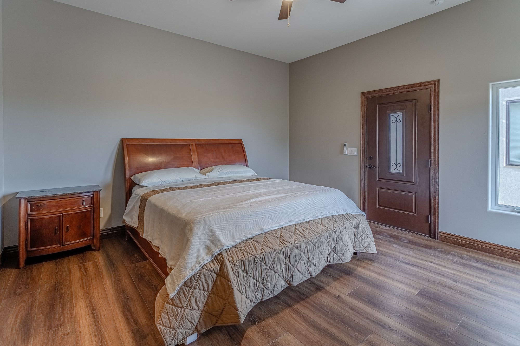 Casita bedroom showing exterior door